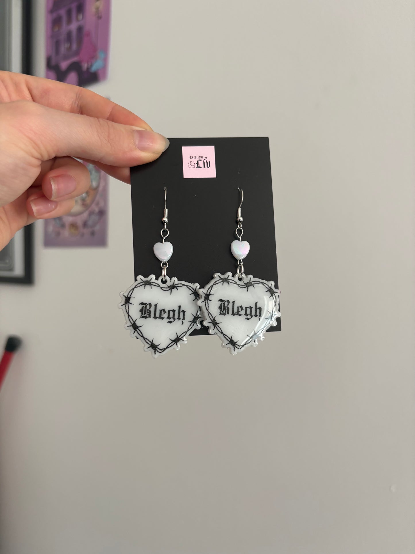 White Blegh Barbed Heart Earrings