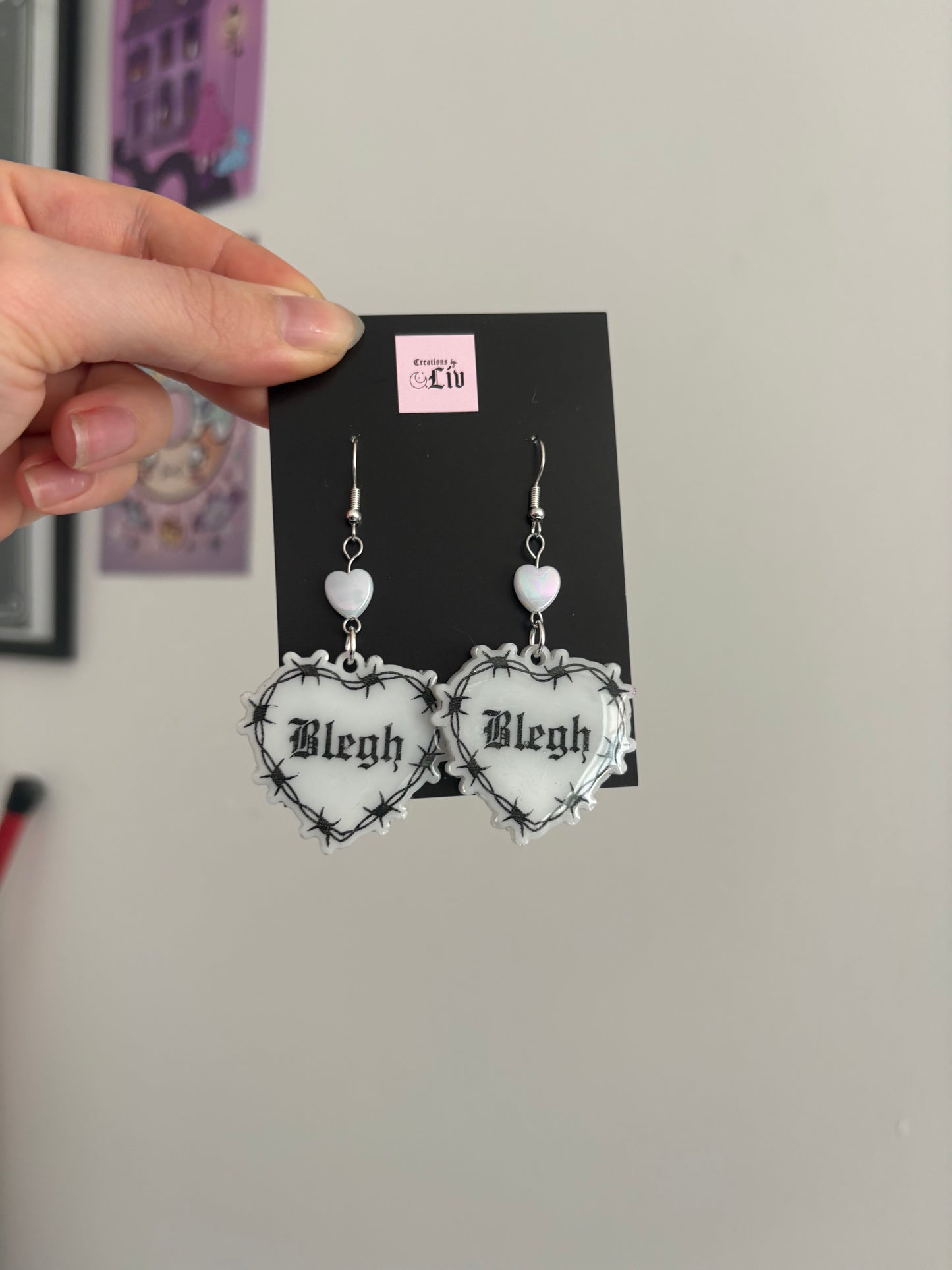 White Blegh Barbed Heart Earrings