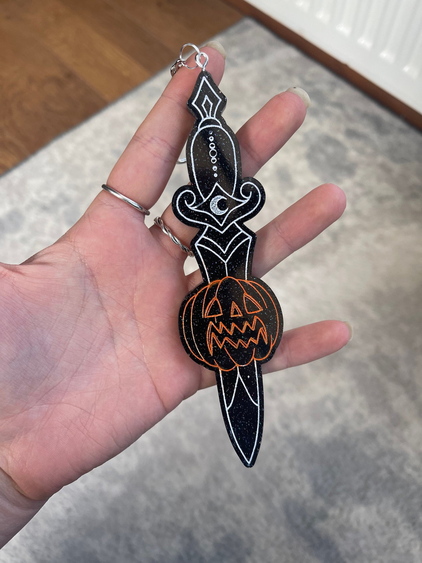 Black Glitter Pumpkin Dagger Wall Hanging