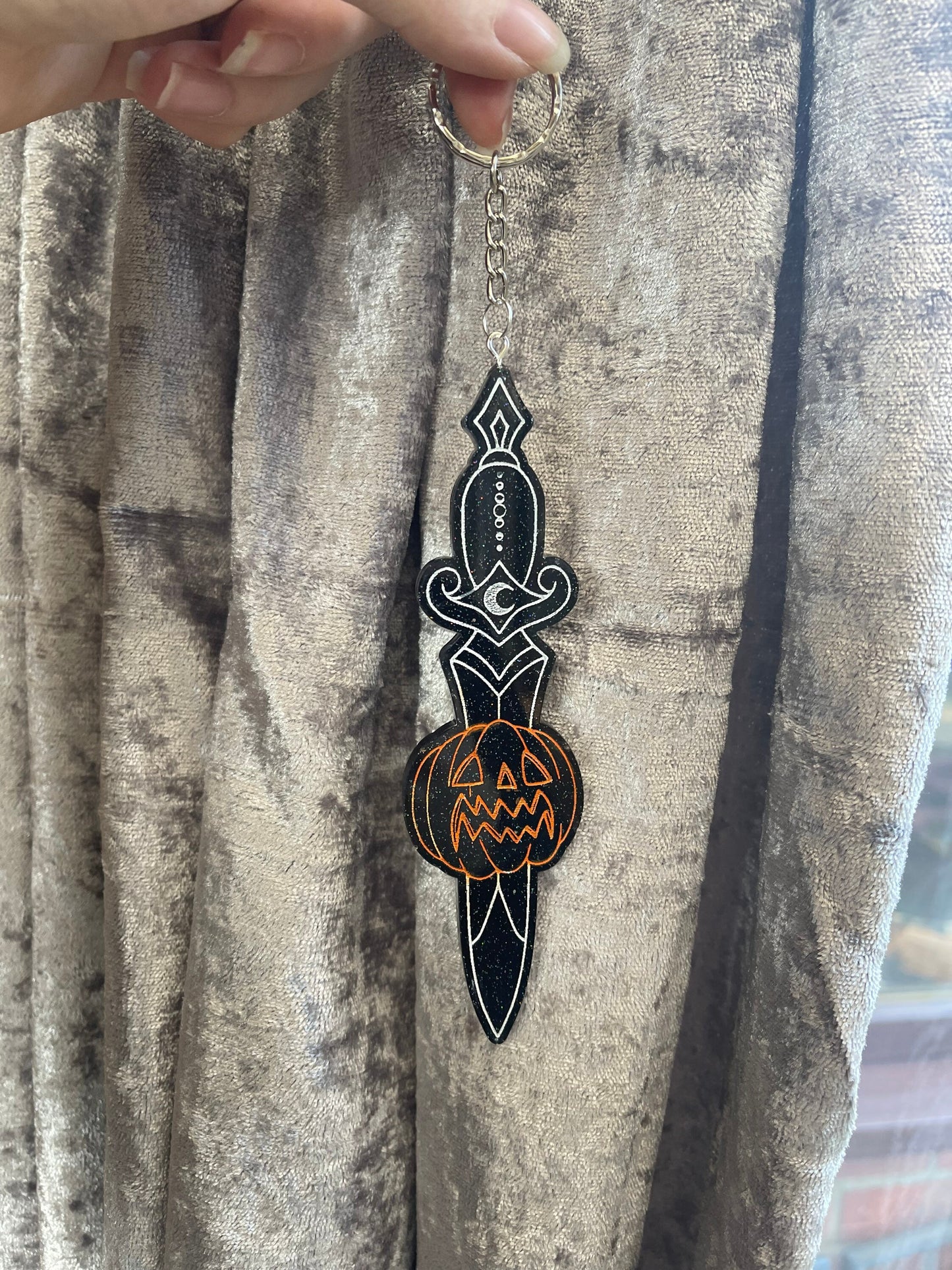 Black Glitter Pumpkin Dagger Wall Hanging