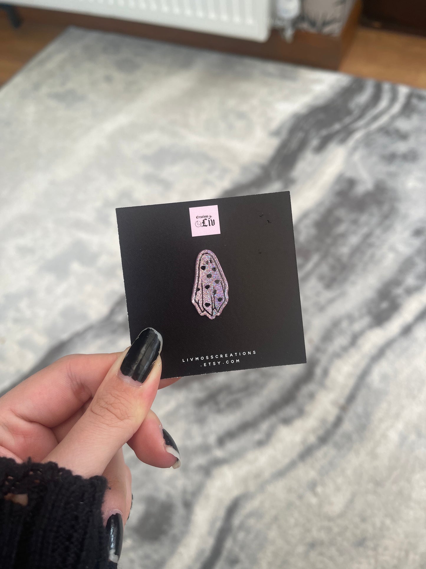 Holographic Pink Ghost Pin